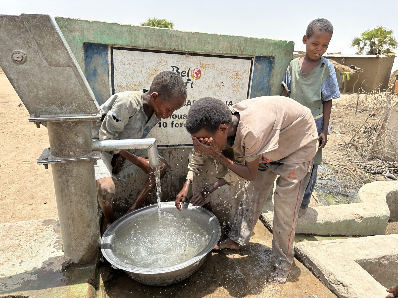 Children at a water pump in Chad