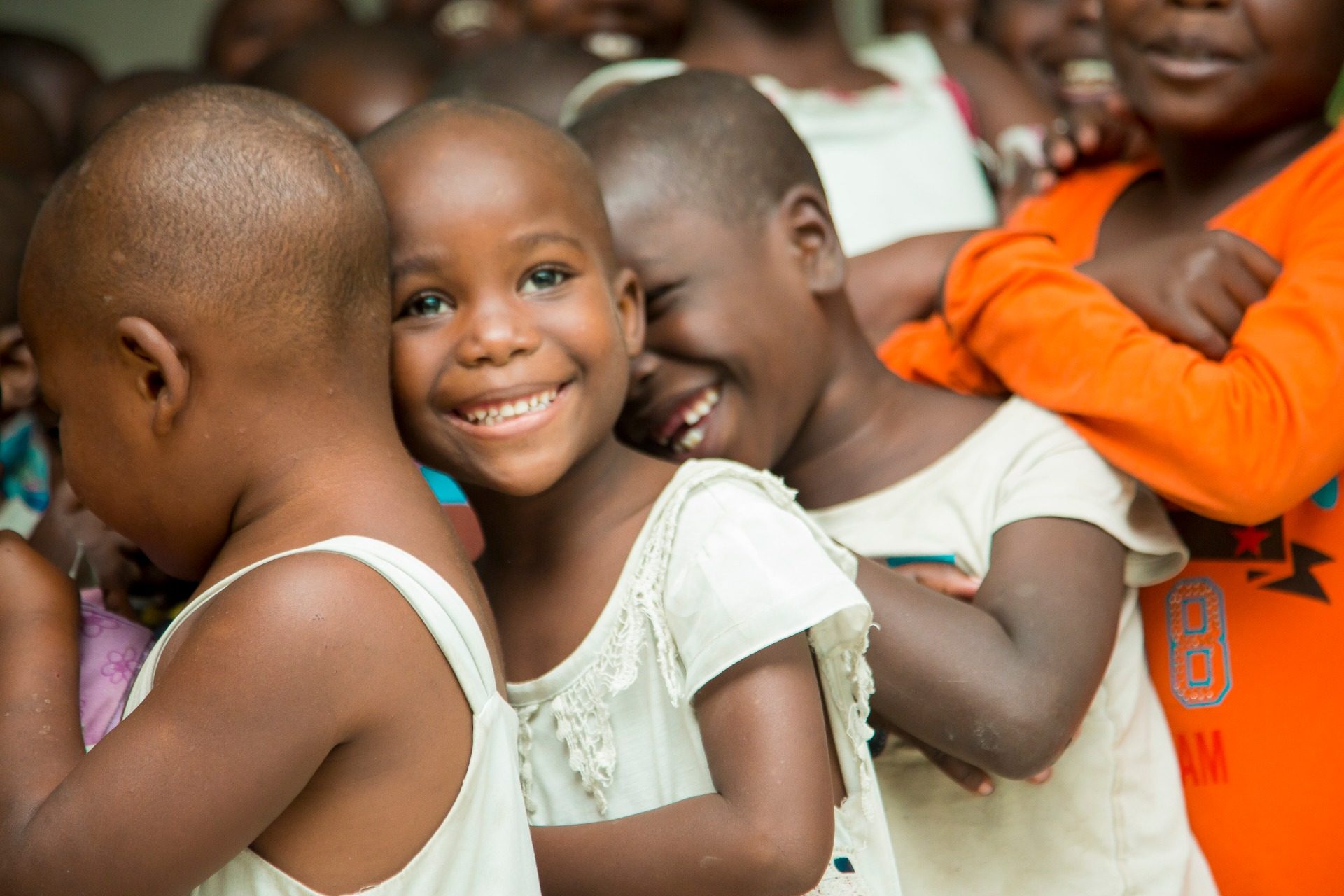 Smiling children supported by Beldefi